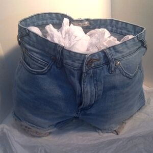 Women's cutoff daisy pocket print 26 shorts